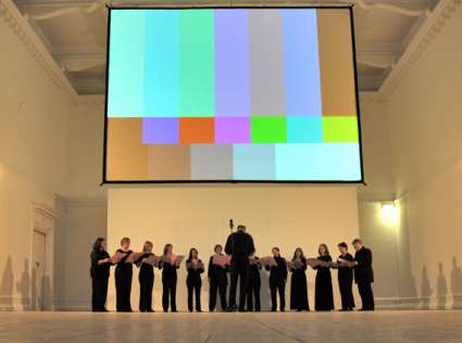 New London Chamber Choir singing with Test Signal displayed above them